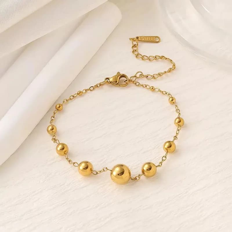 Pulseira Bangle com Corrente e Contas Douradas